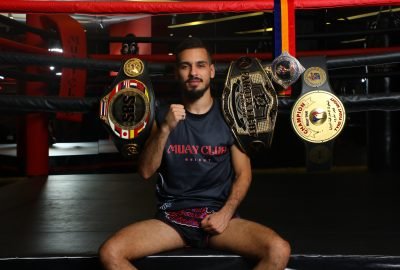 Kru Yai Mahmoud \ghandour with his championship titles